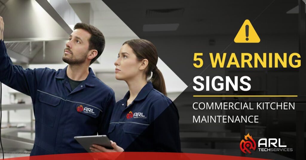 Technicians inspecting commercial kitchen equipment for maintenance signs in Austin Texas.